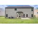 A view of the backyard with a patio at 3225 Rex Ridge Dr, Rex, GA 30273