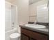 Bathroom with a shower and granite vanity at 3225 Rex Ridge Dr, Rex, GA 30273