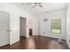 Bedroom featuring hard floors, closet, and natural light at 3225 Rex Ridge Dr, Rex, GA 30273
