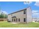 Exterior view of the back of the house with green yard at 3225 Rex Ridge Dr, Rex, GA 30273