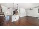Open-concept living area featuring hardwood floors, recessed lighting, and a kitchen view at 3225 Rex Ridge Dr, Rex, GA 30273