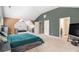 Expansive main bedroom showcasing a sitting area, plush carpet, and ample natural light at 3225 Rex Ridge Dr, Rex, GA 30273