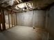 Unfinished basement featuring a concrete floor and exposed insulation at 1822 Millwood Park Ct, Buford, GA 30518
