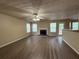 Cozy living room with fireplace and a door to the deck at 1822 Millwood Park Ct, Buford, GA 30518