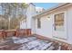 A cozy wooden deck with access to the home, perfect for enjoying the outdoors with ease at 2248 Bethel Rd, Conyers, GA 30012
