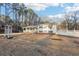 Inviting two-story home with a well-manicured lawn and mature trees at 2248 Bethel Rd, Conyers, GA 30012