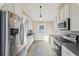 Modern kitchen featuring stainless steel appliances and tile flooring at 2248 Bethel Rd, Conyers, GA 30012