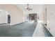 Open living room featuring a stone fireplace and vaulted ceilings at 2248 Bethel Rd, Conyers, GA 30012