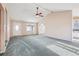 Bright living room with vaulted ceilings and a ceiling fan at 2248 Bethel Rd, Conyers, GA 30012