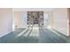 Spacious living room with a stone fireplace and natural light at 2248 Bethel Rd, Conyers, GA 30012