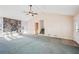 Open concept living room with a stone fireplace and vaulted ceilings at 2248 Bethel Rd, Conyers, GA 30012