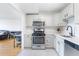 Updated kitchen featuring stainless steel appliances and white cabinets with modern hardware at 2965 Pharr Court South Nw # 1-817, Atlanta, GA 30305