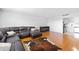 Spacious living area with hardwood floors seamlessly connecting to the kitchen at 2965 Pharr Court South Nw # 1-817, Atlanta, GA 30305