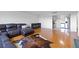 Open-concept living area with hardwood floors and seamless flow to the kitchen featuring stainless appliances at 2965 Pharr Court South Nw # 1-817, Atlanta, GA 30305