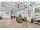 Finished basement with desk, guitar, and bright light at 3331 Doyle Sw Ln, Marietta, GA 30060