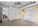 Spacious basement area with a door to another room, closet, unfinished ceiling, and painted white walls at 3331 Doyle Sw Ln, Marietta, GA 30060
