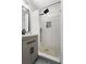 Modern bathroom featuring a stone tiled floor, black fixtures and white subway tiles at 3331 Doyle Sw Ln, Marietta, GA 30060
