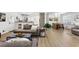 Cozy and inviting living space with modern furniture, seamlessly connected to the dining area and kitchen at 3331 Doyle Sw Ln, Marietta, GA 30060