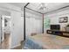 Comfortable bedroom with natural lighting, complemented by modern furniture and ample closet space at 3331 Doyle Sw Ln, Marietta, GA 30060