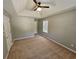 Spacious bedroom featuring neutral walls, soft carpet, and natural light at 71 Streamview Trl, Douglasville, GA 30134