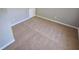Cozy bedroom with carpet, light walls and a closet at 71 Streamview Trl, Douglasville, GA 30134