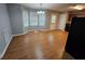 Bright dining area with wood floors, bay window and classic chandelier at 71 Streamview Trl, Douglasville, GA 30134
