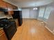 Bright eat-in kitchen featuring a door to the outside and an abundance of windows at 71 Streamview Trl, Douglasville, GA 30134