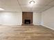 Basement featuring fireplace, tile floors, and ample space at 894 Oak Rd, Lawrenceville, GA 30044