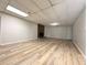 Basement featuring fireplace, tile floors, and ample space at 894 Oak Rd, Lawrenceville, GA 30044
