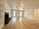 Spacious living room with hardwood floors, a fireplace, and plenty of natural light at 894 Oak Rd, Lawrenceville, GA 30044