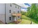 Spacious backyard with deck, green grass, and fence at 1416 Clear Pond Lane, Dacula, GA 30019
