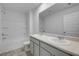 Bathroom with double vanity and shower-tub combo at 1416 Clear Pond Lane, Dacula, GA 30019