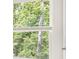 This home has a window with view of the trees at 1416 Clear Pond Lane, Dacula, GA 30019
