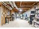 A bare basement with exposed ducts and shelving, ready for customization at 150 Park Creek Dr, Alpharetta, GA 30005