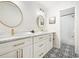 This bathroom has double sinks, white cabinets and a black-and-white patterned floor at 150 Park Creek Dr, Alpharetta, GA 30005