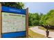 Informative greenway sign with map and details, guiding residents to scenic trails and outdoor adventures at 150 Park Creek Dr, Alpharetta, GA 30005