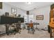 Versatile spare bedroom featuring audio equipment and desk area, perfect for a home office or creative space at 6330 Beaver Crossing Dr, Cumming, GA 30040