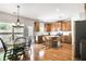 Well-appointed kitchen with stainless steel appliances, an island, and a breakfast nook at 6330 Beaver Crossing Dr, Cumming, GA 30040