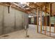 Spacious unfinished basement features concrete walls, exposed ceiling and windows at 110 Slate Ridge Ln, Loganville, GA 30052