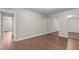 Spacious bedroom features hardwood floors and closet with mirrored doors at 110 Slate Ridge Ln, Loganville, GA 30052