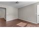 This bedroom features hardwood floors and neutral paint at 110 Slate Ridge Ln, Loganville, GA 30052