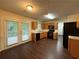 Galley kitchen featuring wood cabinets and stainless steel appliances at 110 Slate Ridge Ln, Loganville, GA 30052