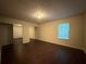Main bedroom with laminate floors and double closets at 110 Slate Ridge Ln, Loganville, GA 30052