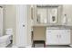 Bathroom featuring a large mirror, vanity lighting, and ample storage space at 821 Ralph Mcgill Ne Blvd # 3325, Atlanta, GA 30306