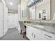Bathroom featuring a large mirror, vanity lighting, and spacious design at 821 Ralph Mcgill Ne Blvd # 3325, Atlanta, GA 30306