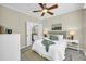 Cozy bedroom with plush bedding, a ceiling fan, and ample natural light, creating a relaxing atmosphere at 821 Ralph Mcgill Ne Blvd # 3325, Atlanta, GA 30306
