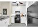 Modern kitchen with white cabinets, sleek appliances, and granite countertops at 821 Ralph Mcgill Ne Blvd # 3325, Atlanta, GA 30306