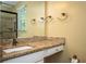Bathroom features a granite vanity, a large mirror, and neutral colors at 2980 Milford Sw Trl, Marietta, GA 30008