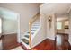 Welcoming entryway features hardwood floors, a staircase, and access to multiple rooms at 2980 Milford Sw Trl, Marietta, GA 30008