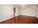 Spacious living room featuring hardwood floors and a ceiling fan at 2980 Milford Sw Trl, Marietta, GA 30008